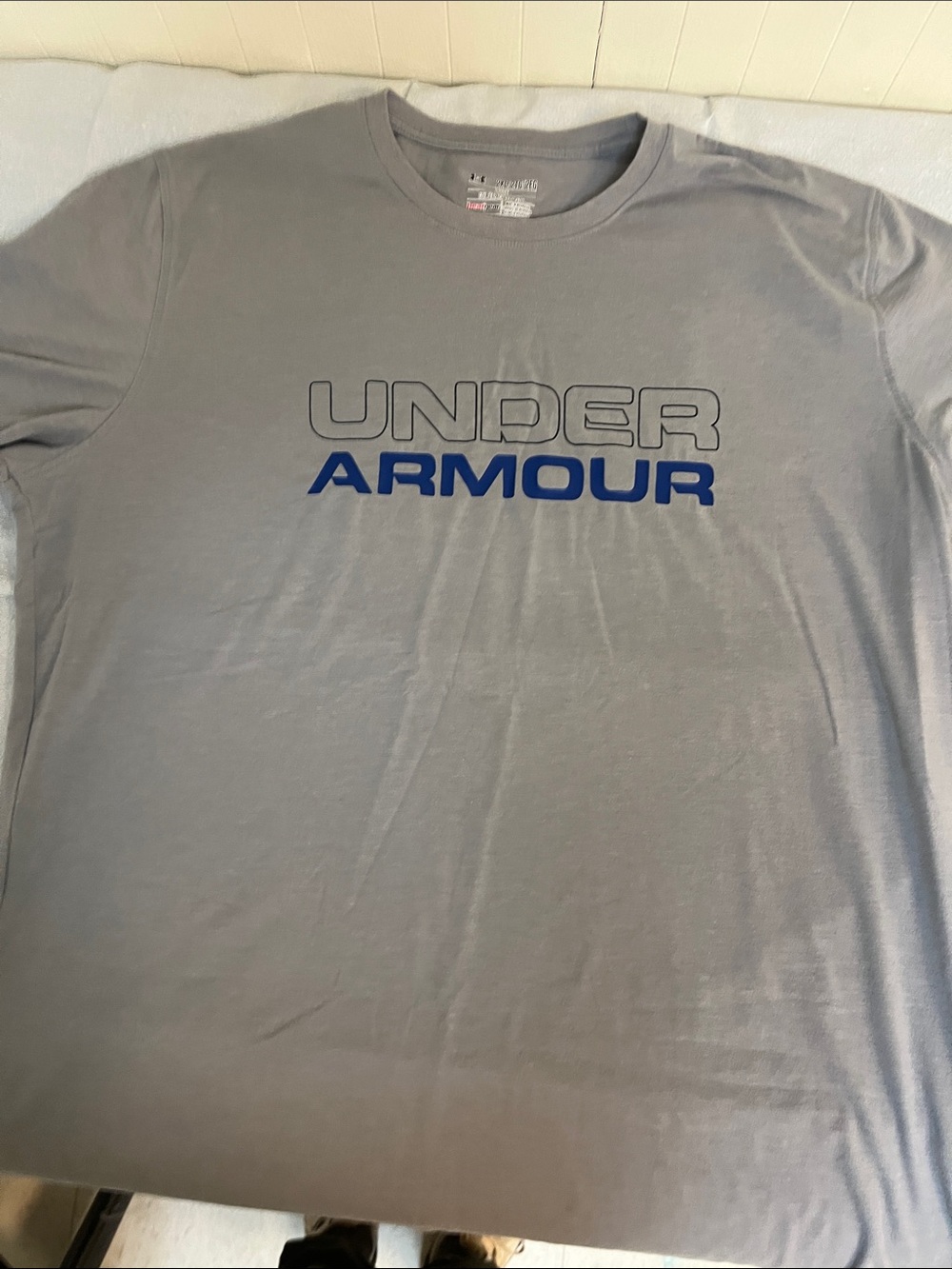 Under Armour Men’s Light Gray T-Shirt with Blue Logo